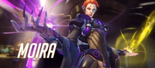 Science will prevail. Moira is introduced. [Image via PlayOverwatch/YouTube screencap]