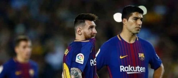 Lionel Messi com seu amigo Suarez Lionel Messi com seu amigo Suarez