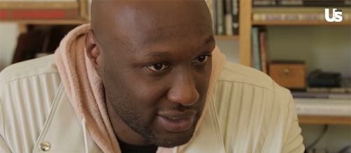 Lamar Odom opens up about his feelings about Khloe Kardashian's rumored pregnancy. (Us Weekly/YouTube)