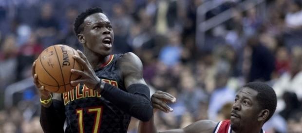 Dennis Schroder tries to go for a layup (via Keith Allison/Flickr) Dennis Schroder tries to go for a layup (via Keith Allison/Flickr)