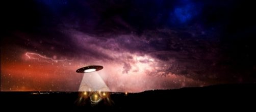 Drunk time traveller warns of Alien invasion [image by Pixabay of a Alien UFO by cocoparisienne]