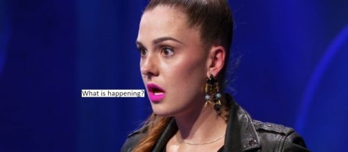 'Project Runway' contestant Claire Buitendorp's jaw dropped as a fellow designer stormed off the stage. [Image via MyLifetime/YouTube]