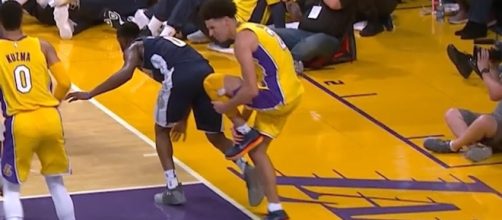 Los Angeles Lakers' Lonzo Ball injured during play against the Denver Nuggets. (Image Credit - Ximo Pierto/YouTube Screenshot)