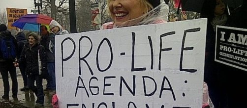 Pro-choice activist demonstrates at rally - Debra Sweet via Flickr
