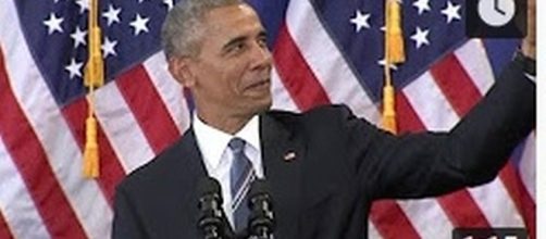 Barack Obama poses for a selfie [Image Source: CNN/YouTube]