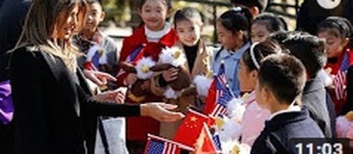 Melania Trump with children in China [Based Patriot/YouTube]