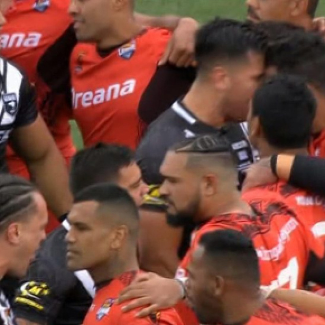 New Zealand players square up to the Tongans at the end of their infamous Haka display - thesun.co.uk