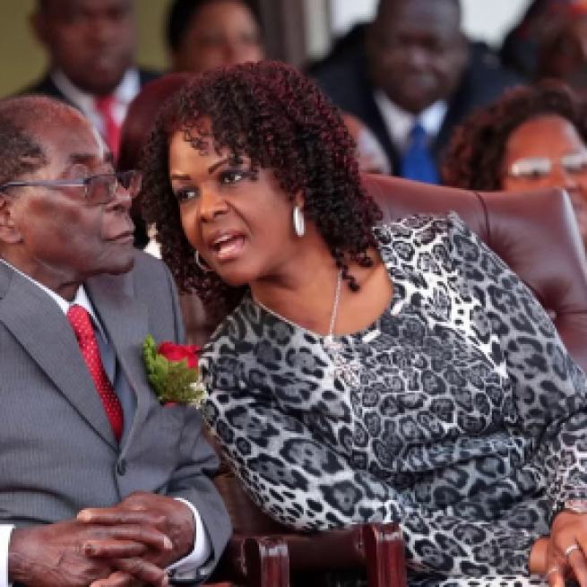 Mugabe and his wife Grace. Photo credit -( screen shot youtube.com)