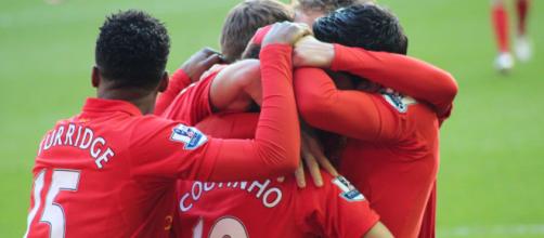 Liverpool players celebrate Philippe Coutinho's goal in the past. (Image Credit: Dean Jones/Flickr)