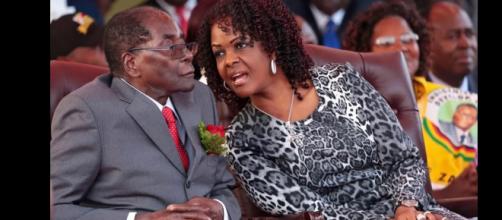 Mugabe and his wife Grace. Photo credit -( screen shot youtube.com)