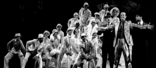 Peter Allen (far right) and the company of the Original 1988-89 Broadway Production of ‘Legs Diamond'. (Image via Martha Swope.)