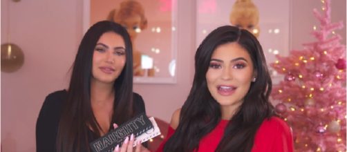 Kylie Jenner and Khloe Kardashian doing everything to hide their 'baby bump'. Image credit: Kylie Cosmetics/Youtube screenshot
