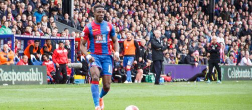 Crystal Palace striker Wilfried Zaha in action in a past match. (Image credit: Gordon Judge/Flickr)