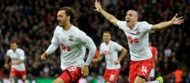 Southampton striker Manolo Gabbiadini (in front) celebrates with Oriol Romeu in a past match. (Image Credit: Indolivescore/Flickr) Southampton striker Manolo Gabbiadini (in front) celebrates with Oriol Romeu in a past match. (Image Credit: Indolivescore/Flickr)