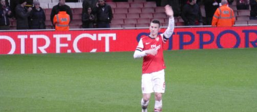 Arsenal defender Laurent Koscielny waves at the fan in a past match. (Image Credit: Wonker/Flickr)