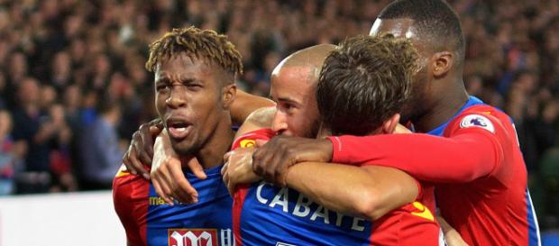 Crystal Palace players celebrate a goal in a game that they beat Arsenal 3-0 in the past. (Image Credit: Richard Fisher/Flickr) Crystal Palace players celebrate a goal in a game that they beat Arsenal 3-0 in the past. (Image Credit: Richard Fisher/Flickr)