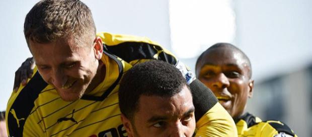 Watford players celebrate Troy Deeney's goal in the past. (Image Credit: MekyCM/Flickr) Watford players celebrate Troy Deeney's goal in the past. (Image Credit: MekyCM/Flickr)