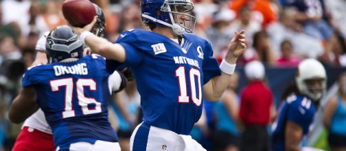 Is it time to leave Eli Manning behind? [Image via By Tech. Sgt. Michael Holzworth [Public domain], via Wikimedia Commons]