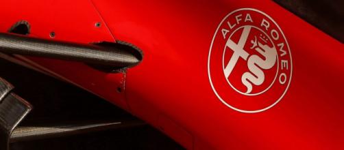Alfa Romeo car with a logo [Image Credit: Formula 1]
