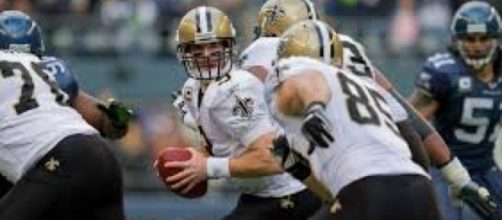 Drew Brees hopes to keep the Saints atop the NFC South against the Panthers. Image Source: Flickr | Kelly Bailey
