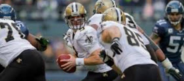 Drew Brees hopes to keep the Saints atop the NFC South against the Panthers. Image Source: Flickr | Kelly Bailey Drew Brees hopes to keep the Saints atop the NFC South against the Panthers. Image Source: Flickr | Kelly Bailey