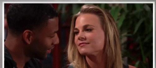 Phyllis distracts Jordan while Hilary snoops. (Image via The Young and the Restless worldwide youtube screencap).