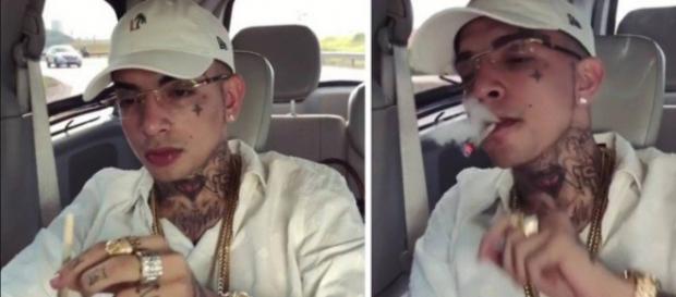 MC Guimê aparece fumando cigarro suspeito (Foto: Captura de vídeo) MC Guimê aparece fumando cigarro suspeito (Foto: Captura de vídeo)