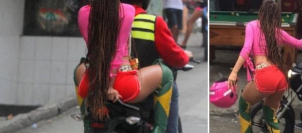 Anitta sobe o morro do Vidigal de mototáxi em clipe de 'Vai Malandra'. Placa da moto faz alusão ao projeto e Lei. (Foto Reprodução). Anitta sobe o morro do Vidigal de mototáxi em clipe de 'Vai Malandra'. Placa da moto faz alusão ao projeto e Lei. (Foto Reprodução).