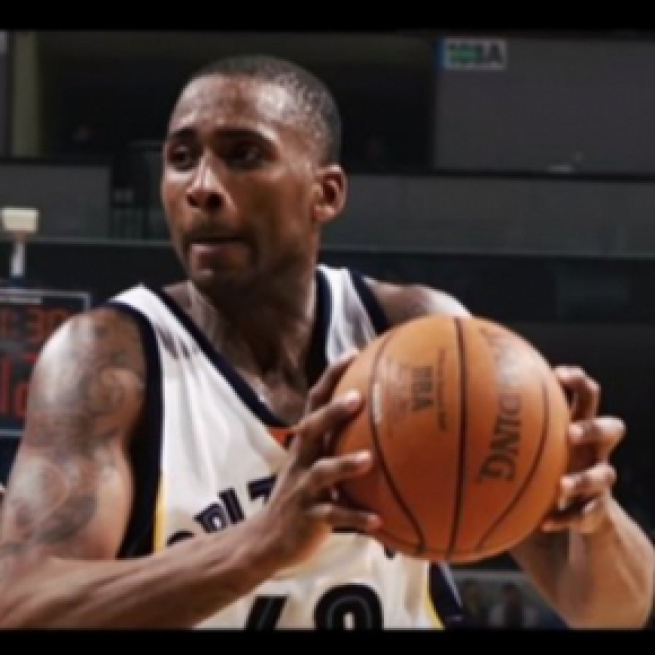 Slain former NBA player Lorenzen Wright. - [Image from Sports Illustrated / YouTube screencap]
