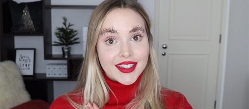 Taylor R made one of the craziest holiday-themed makeup trends with Christmas tree eyebrows. [Image Credit: Taylor R/YouTube screencap]