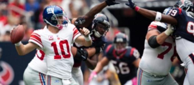 Eli Manning threw for 434 yards and three touchdowns in Week 15. (Image via: AJ Guel/Flickr) Eli Manning threw for 434 yards and three touchdowns in Week 15. (Image via: AJ Guel/Flickr)