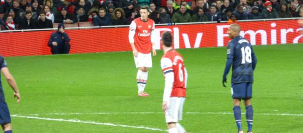 Mesut Ozil preparingto take a free-kick against Manchester United in a past match. (Image Credit: Wonker/Flickr) Mesut Ozil preparingto take a free-kick against Manchester United in a past match. (Image Credit: Wonker/Flickr)