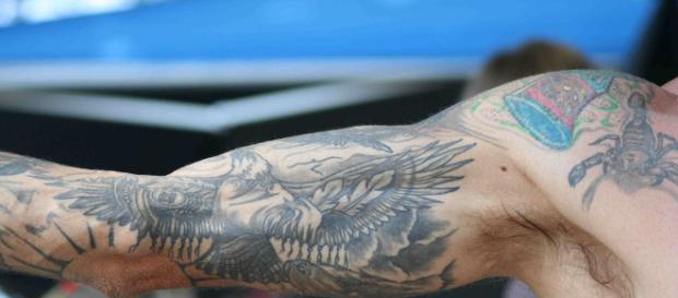 Tattoos on the arms | (Image via Elvert Barnes/Flickr) Tattoos on the arms | (Image via Elvert Barnes/Flickr)