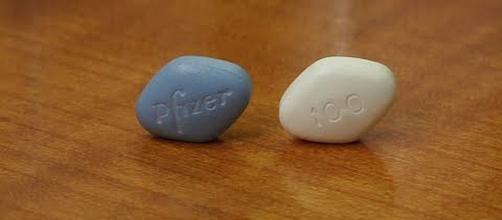 Pfizer is launching a cheaper generic white pill on Monday, December 11 [Image: Associated Press/YouTube screenshot]