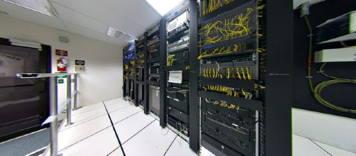 Telecommunications equipment in one corner of a small data center. - [Image Credit: Wikimedia Creative Commons]