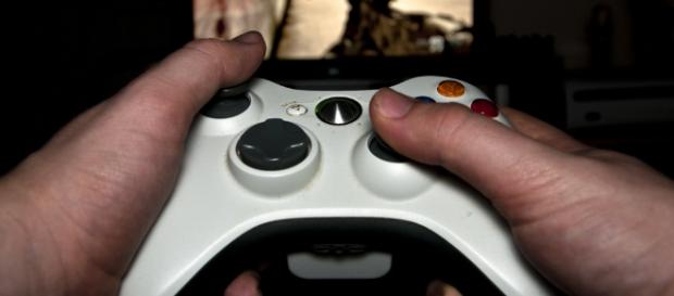 Gamer playing a game -- Luke Hayfield/Flickr. Gamer playing a game -- Luke Hayfield/Flickr.