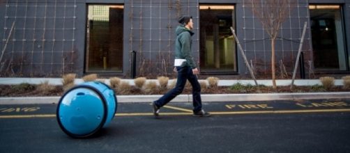 From Vespa scooters, Piaggio unveils the Gita carry-robot that follow you around. / Photo from 'Dezeen' - dezeen.com