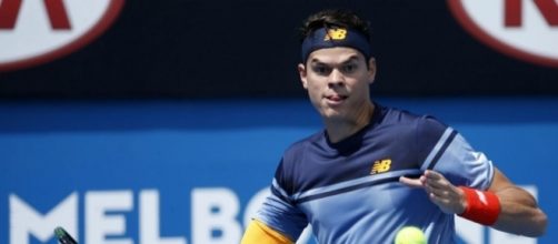 Raonic hitting a forehand in Australia. Resurgent Milos Raonic wins first-round match at Australian Open ... - thestar.com (Taken from BN library)