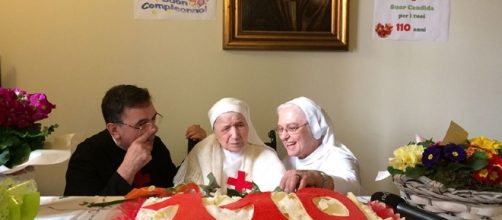 Sister Candida Begotti (in the middle) as she marks her 110 th birthday