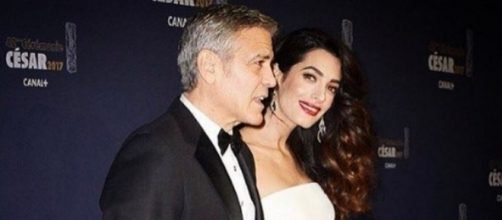 George y Amal Clooney en la alfombra roja