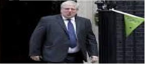 Patrick McLoughlin walking out of Downing Street
