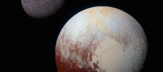 Debate on to make Pluto a planet again.| Science | Smithsonian - smithsonianmag.com Debate on to make Pluto a planet again.| Science | Smithsonian - smithsonianmag.com