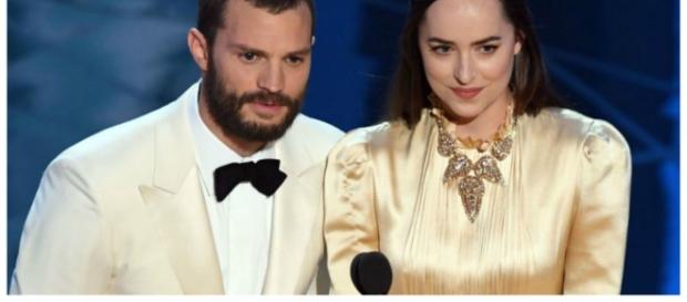 Jamie Dornan e Dakota Johnson durante a cerimônia do Oscar 2017 Jamie Dornan e Dakota Johnson durante a cerimônia do Oscar 2017