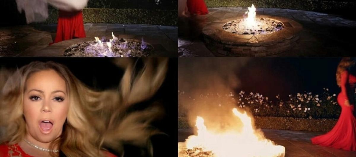 Mariah Carey Burns 250 000 Valentino Wedding Dress In Musical Video
