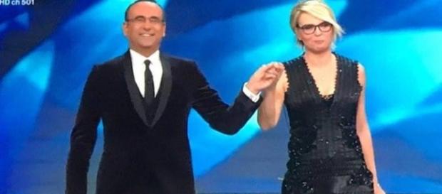 Carlo Conti consapevole di aver apportato un significativo salto di qualità al suo Festival con la partecipazione di Maria De Filippi Carlo Conti consapevole di aver apportato un significativo salto di qualità al suo Festival con la partecipazione di Maria De Filippi