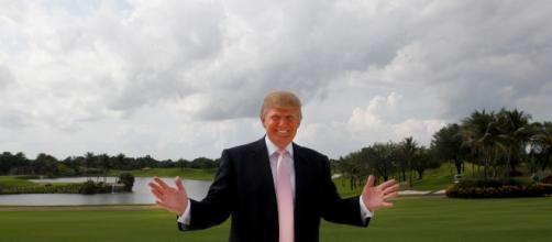Donald Trump standing on a golf course - http://framework.latimes.com/2015/05/07/reframed-smile-a-photo-anthology-by-vii/