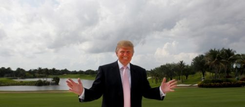 Donald Trump standing on a golf course - http://framework.latimes.com/2015/05/07/reframed-smile-a-photo-anthology-by-vii/