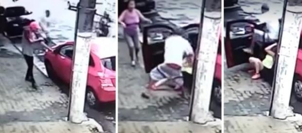 Vítima é arrancada do carro com violência Vítima é arrancada do carro com violência