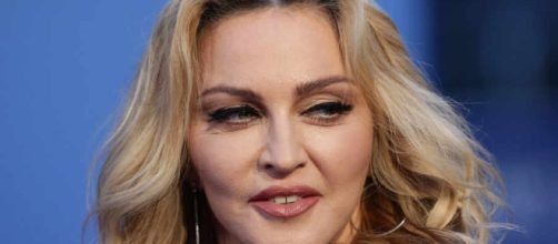 Madonna is a 'new' mom again after being allowed to adopt 2-year-old twin girls from Malawi. / Photo from 'Shropshire Star" - shropshirestar.com