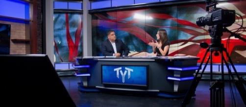 Cenk Uygur and Ana Kasparian, on the set of The Young Turks / tytvault, Flickr CC BY-SA 2.0